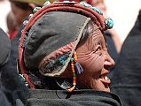 Mustang Lo Manthang Tiji Festival Day 2 01-1 Woman In Traditional Dress Many of the women wore their finest traditional Tibetan dress and jewelry on the second day of the Tiji Festival in Lo Manthang. Here is an especially beautiful woman I spotted in the crowd.